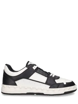 Valentino Garavani   Freedots leather low top sneakers 