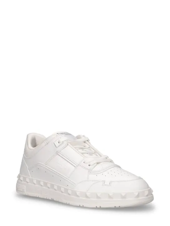 Valentino Garavani   Freedots leather low top sneakers 