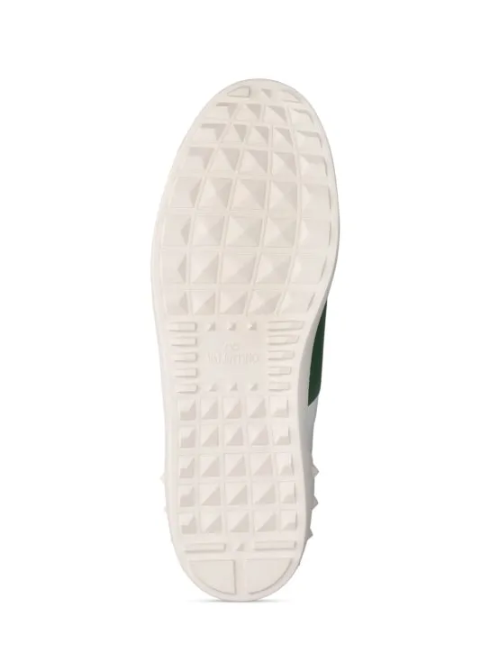 Valentino Garavani   Open leather low top sneakers 